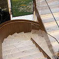 Modern Staircase With Wooden Steps In Elegant Interior Design With Lighting And Green Plants
