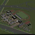 School Campus Buildings With Football Field Basketball Courts Lush Greenery And Surrounding Roads