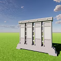 Stone Screen Wall With Carved Panels And Base In Green Grass Under Blue Sky