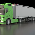 Green Modern Semi Truck Featuring White Cargo Trailer And Sleek Design