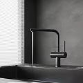 Modern Black Faucet With Water Flow Near White Blinds And Gray Wall