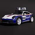 Porsche 953 Blue And White Sports Car With Roof Mounted Equipment And Racing Stripes