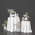 Decorative Ornament Set with Vases Flower Arrangements Miniature Decor and Greenery on White Tablecloths