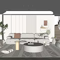 Modern Living Room Interior With White Sofa Round Coffee Table Area Rug And Decorative Painting
