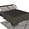 Comfortable Double Bed With Wooden Headboard Gray Pillows And Patterned Quilt On White Geometric Rug