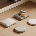 Light Colored Square Cushions And Round Ottomans In Wooden Floor Room