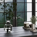 Green Plants In Glass And White Vases On Window Sill With Mountain View Window Grilles