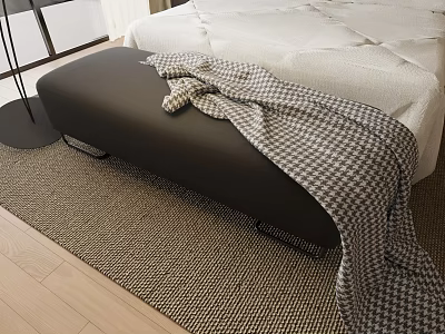 Black Leather Ottoman With Houndstooth Blanket Next To Bedroom Bed On Area Rug 3d model