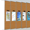 Wooden Display Shelves With Yearly Posters And Information Charts From 1995 To 2020