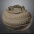 Carved Sculptural Pottery Jar With Lid Handles And Intricate Circular Patterns