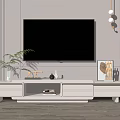 Modern White TV Stand With Storage Drawers And Decorative Items In Living Room