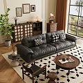 Modern Leather Sofa with Checkerboard Pillows and Round Wooden Coffee Table on Geometric Rug