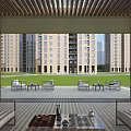 Indoor View of Courtyard Garden With Outdoor Furniture Lawn Paved Flooring and High Rise Buildings