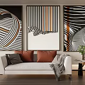 Stylish Living Room Decor With Abstract Paintings Sofa Cushions And Plant