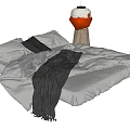 Double Bed with Grey Sheets Black Pillow Blanket Beside Wooden Bedside Table and Hanging Lamp