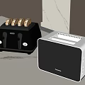 Modern Kitchen Appliances Black Toaster with Toasted Bread and White Oven on Marble Countertop