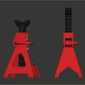 Pair Of Red Jack Stands With Black Top And Tripod Base On Dark Reflective Surface