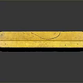 Vintage Yellow Rectangular Container With Worn Surface And Reflection On Black Surface