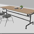 Industrial Table and Chair Set with Wooden Tabletop Black Metal Frame Gray Seats and Potted Plant