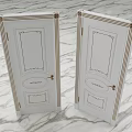 Classic White Swing Doors Featuring Gold Accents And Handles On Marble Surface