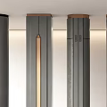 Modern Decorative Columns With Golden Accents And Textured Designs In Interior Space