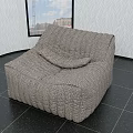 Woven Brown Bean Bag Chair In Room With Black Tiles White Patterned Walls And Window