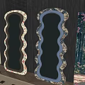 Decorative Scalloped Edge Mirrors With Floral Patterned Frames And Candle Holders On Checkerboard Floor