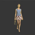 Woman in Blue Sleeveless Top and Floral Printed Skirt Holding Blue Handbag Wearing Sandals