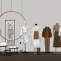 Mannequins In Clothing Store Wearing Various Styles With Circular Light Shoes Bags And Tables