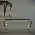 Elegant Black Table With Shiny Metal Curved Legs And Modern Design