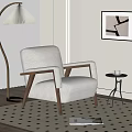 Cream Fleece Lounge Chair With Wooden Armrests Floor Lamp And Side Table In Cozy Interior