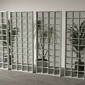 Modern Glass Partition With Grid Design And Indoor Plants For Interior Space