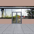 Glass Double Doors In Modern Commercial Exterior With Large Windows Brown Facade And Stone Floor
