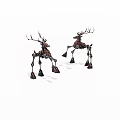 Two Vintage Metal Deer Sculptures With Antlers In Standing Pose
