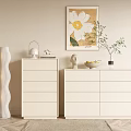 Stylish Entryway Cabinet And Sideboard With Light Colored Drawers Decorative Painting And Potted Plant