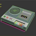 Vintage Computer Peripheral Featuring Light Blue Casing Speaker Grill And Control Buttons