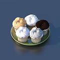 Delicious Assorted Cupcakes With Various Frosting Colors Served On Green Plate