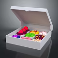 Open White Box With Colorful Desserts Including Strawberries Cream And Cupcakes