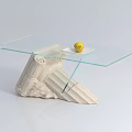 Stylish Glass Top Coffee Table With Antique White Column Base And Yellow Fruit On Plate