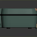 Teal Green Compact Electronic Appliance With Orange Top Gold Accents And Brand Logo
