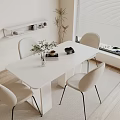Minimalist Dining Table Set With White Table Beige Chairs And Potted Plant Near Window