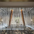 Hotel Lobby Featuring Stunning Waterfall Wall With Wooden Pillars And Luxurious Marble Floor