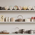 Traditional Tea Set Display With Teapots Cups And Round Containers On Shelves