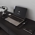 Apple Laptop On Office Desk With Silver Desk Lamp Wireless Mouse Phone And Notebook
