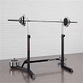 Sturdy Barbell Rack With Barbell And Weight Plates In Gym Workout Space