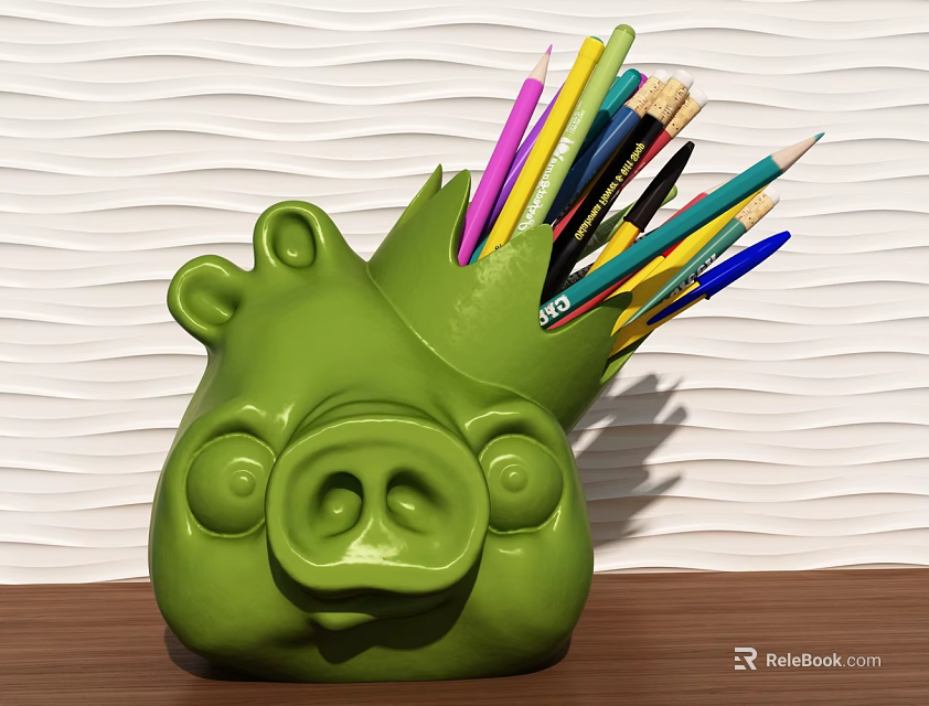 Green Pig Shaped Pencil Holder With Colorful Pencils On Wooden Table 3d model 