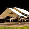 Outdoor Canopy With Wooden Frame White Canvas Roof And String Lights On Grassy Platform