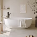 White Freestanding Bathtub With Black Faucet Towel Toiletry Bottles And Dried Branches In Modern Bathroom