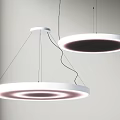 Modern Circular White Pendant Lights With Illuminated Rings In Interior Space 3d model