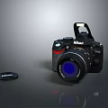 Nikon D7200 Digital Camera With Lens Cap On Dark Reflective Surface